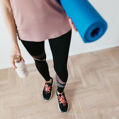 Close-up of a yoga mat and a water bottle.